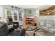 Cozy living room featuring a large window, comfortable seating, and stylish decor at 3090 W 107Th Pl # F, Westminster, CO 80031