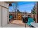 Private outdoor patio with wood accents, furniture, and grill at 3090 W 107Th Pl # F, Westminster, CO 80031