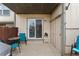 Private patio with covered area, storage, and access to the backyard at 3090 W 107Th Pl # F, Westminster, CO 80031