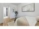 Cozy bedroom featuring a contemporary design and access to an attached bathroom at 717 Inca St, Denver, CO 80204