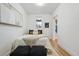 Bright bedroom with neutral tones and a comfortable aesthetic at 717 Inca St, Denver, CO 80204