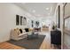 Bright living room featuring modern decor, hardwood floors and an open floor plan at 717 Inca St, Denver, CO 80204