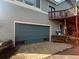 Attached garage featuring ample space, convenient access, and functional design at 4724 Hopi Rd, Indian Hills, CO 80454