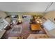 View of living room and dining area with wood floors at 4724 Hopi Rd, Indian Hills, CO 80454