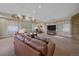 Spacious living room with carpeted floor and lots of natural light at 4724 Hopi Rd, Indian Hills, CO 80454