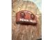 Indian Hills sign etched on mountain. Elevation 6,800 ft at 4724 Hopi Rd, Indian Hills, CO 80454