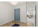 Neutral bedroom with sliding closet doors leading into a comfortable sitting area at 3384 Cranston Cir, Highlands Ranch, CO 80126