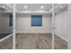 Bedroom featuring wood-look flooring, recessed lighting, and a large window for natural light at 3384 Cranston Cir, Highlands Ranch, CO 80126