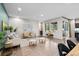 Bright living room with hardwood floors, neutral walls, and stylish furnishings, with lots of space at 3384 Cranston Cir, Highlands Ranch, CO 80126