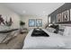 Serene main bedroom with cozy seating, a stylish rug, and a peaceful ambiance at 3384 Cranston Cir, Highlands Ranch, CO 80126