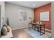 Modern office space features textured wall decor, stylish furniture, and a bright window at 3384 Cranston Cir, Highlands Ranch, CO 80126
