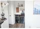A charming bar area is featured, complete with wine coolers and liquor shelving at 10534 Oncilla Ln, Lone Tree, CO 80124