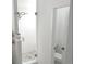 The bathroom features a glass enclosed shower with stylish tiling and fixtures at 10534 Oncilla Ln, Lone Tree, CO 80124