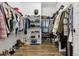 Large walk-in closet featuring ample storage and organizational space at 10534 Oncilla Ln, Lone Tree, CO 80124