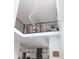 A view of the home's interior with tall ceilings and hanging decorative lighting at 10534 Oncilla Ln, Lone Tree, CO 80124