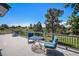 Outdoor living space featuring a charming deck with comfortable seating and stunning green views at 5542 Ponderosa Dr, Parker, CO 80134