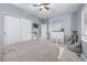 Inviting bedroom with white metal bed frame, closet, and bright natural light at 28495 La Donna Vista Ln, Elizabeth, CO 80107