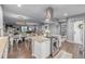 Open-concept kitchen and dining area with modern appliances and stylish decor at 28495 La Donna Vista Ln, Elizabeth, CO 80107