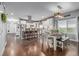 Spacious open-concept kitchen with stainless steel appliances and adjacent dining area at 28495 La Donna Vista Ln, Elizabeth, CO 80107