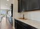 Kitchen boasts stainless steel appliances, granite countertops, and white subway tile backsplash at 10114 Atlanta St, Parker, CO 80134