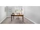 Office boasts natural light, neutral paint, and modern desk at 10114 Atlanta St, Parker, CO 80134