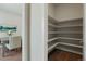 Walk-in pantry with adjustable shelving for ample storage at 10114 Atlanta St, Parker, CO 80134