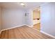 Bonus room with updated wood-look floors and access to another room at 5350 E 66Th Way, Commerce City, CO 80022