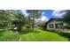 Backyard with trees and lawn at 7194 S Himalaya Way, Centennial, CO 80016