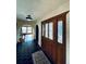 Entryway with stained glass front door, tile flooring, and arched doorways, creating an inviting entrance at 7194 S Himalaya Way, Centennial, CO 80016