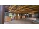 View of the horse barn featuring wooden stalls and an open, airy layout at 7194 S Himalaya Way, Centennial, CO 80016