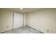 Unfinished room with painted floors and access to outlets at 7194 S Himalaya Way, Centennial, CO 80016