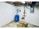 Image of water heater and utility equipment in a home's utility room at 7194 S Himalaya Way, Centennial, CO 80016