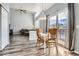 Dining area with table and chairs, open to the kitchen at 12460 S Hollow Creek Ct, Parker, CO 80134