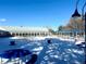 Frozen pool and patio furniture in winter at 12460 S Hollow Creek Ct, Parker, CO 80134