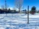 Outdoor volleyball court covered in snow at 12460 S Hollow Creek Ct, Parker, CO 80134