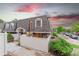 Charming townhome featuring a privacy fence, well-manicured bushes, and a quaint outdoor space at 15491 E Wyoming Dr # A, Aurora, CO 80017