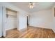 Bedroom showcases spacious layout, hardwood floors, and closet at 283 Garland Dr, Northglenn, CO 80233