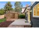 Well-kept backyard featuring a concrete patio and pergola, perfect for outdoor relaxation and entertaining at 1660 S Kingston Way, Aurora, CO 80012