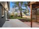 Backyard featuring a patio, garden beds, mature trees, and a pergola at 1660 S Kingston Way, Aurora, CO 80012