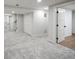 Finished basement with neutral carpet, white doors, and versatile space for living or recreation at 1660 S Kingston Way, Aurora, CO 80012