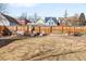 Spacious backyard with a wooden fence, picnic table, barbecue grill and outdoor seating, perfect for entertaining at 85 N Grant St # 30, Denver, CO 80203