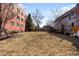 A large backyard with mature trees and a hammock, offering a serene outdoor retreat at 85 N Grant St # 30, Denver, CO 80203