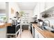 Well-lit kitchen features modern appliances, ample counter space, and plenty of storage at 85 N Grant St # 30, Denver, CO 80203