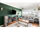 Bright living room with modern decor, comfortable seating, and large windows for natural light at 85 N Grant St # 30, Denver, CO 80203
