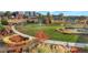 Aerial view of a park with walking paths and landscaping at 6618 E Lowry Blvd # 210, Denver, CO 80230