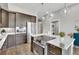 Modern kitchen featuring stainless steel appliances and an island at 6618 E Lowry Blvd # 210, Denver, CO 80230
