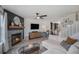 Inviting living room with stylish fireplace, comfortable seating, and modern decor at 5250 Cody St, Arvada, CO 80002