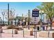 Arvada's Olde Town Pedestrian Mall entrance sign and surrounding pedestrian area with seating at 5250 Cody St, Arvada, CO 80002