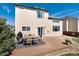Spacious backyard with a deck, outdoor furniture, and well-maintained lawn at 4963 Collingswood Dr, Highlands Ranch, CO 80130