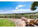 Enjoy the outdoors on this stone patio with green space and scenic views, perfect for relaxation and entertaining guests at 4963 Collingswood Dr, Highlands Ranch, CO 80130